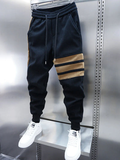 拓真 | シグネチャーストライプジョガー